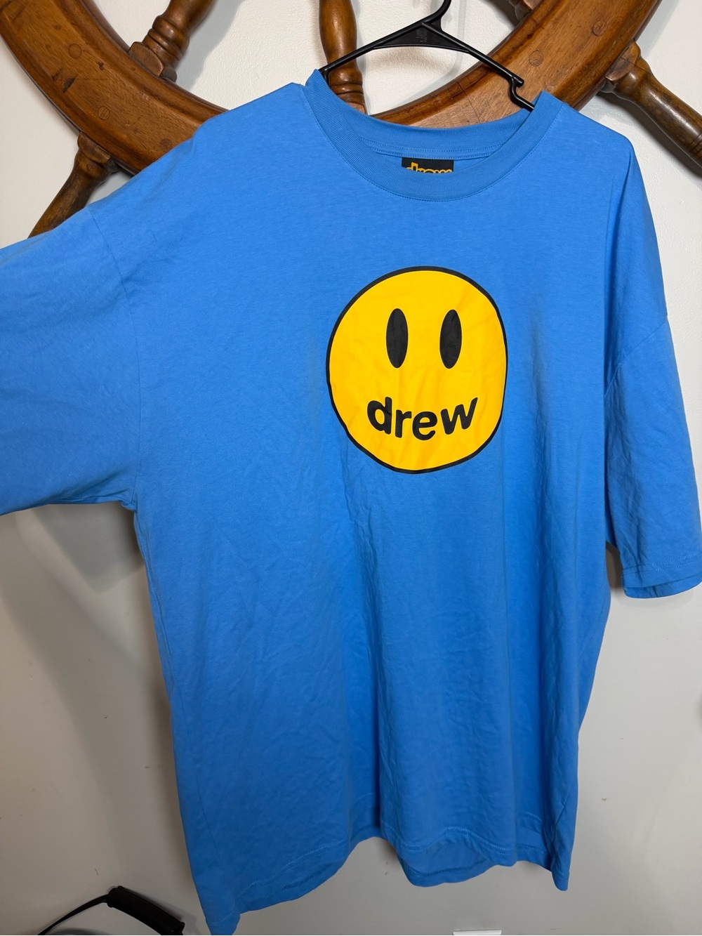 drew house blue tee with yellow logo